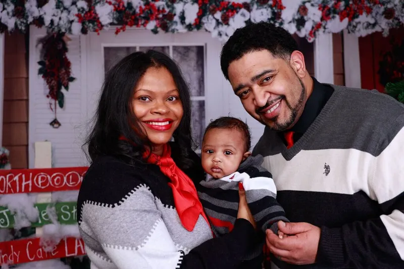 Lavell's family posing for a photo