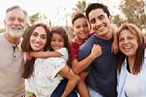 Family with two young kids and grandparents.