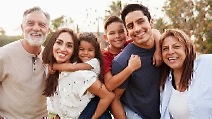 Family with two young kids and grandparents.