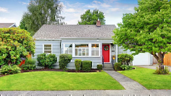 Light Blue Residential House with Red Door