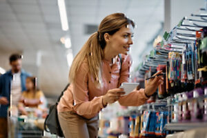 A woman shops for school supplies.