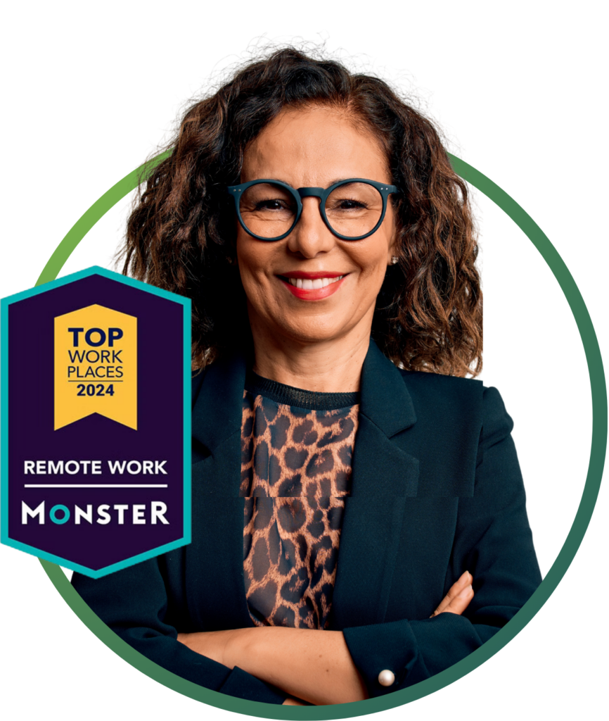 A person with glasses crossing their arms. With a logo of Top place to work logo.